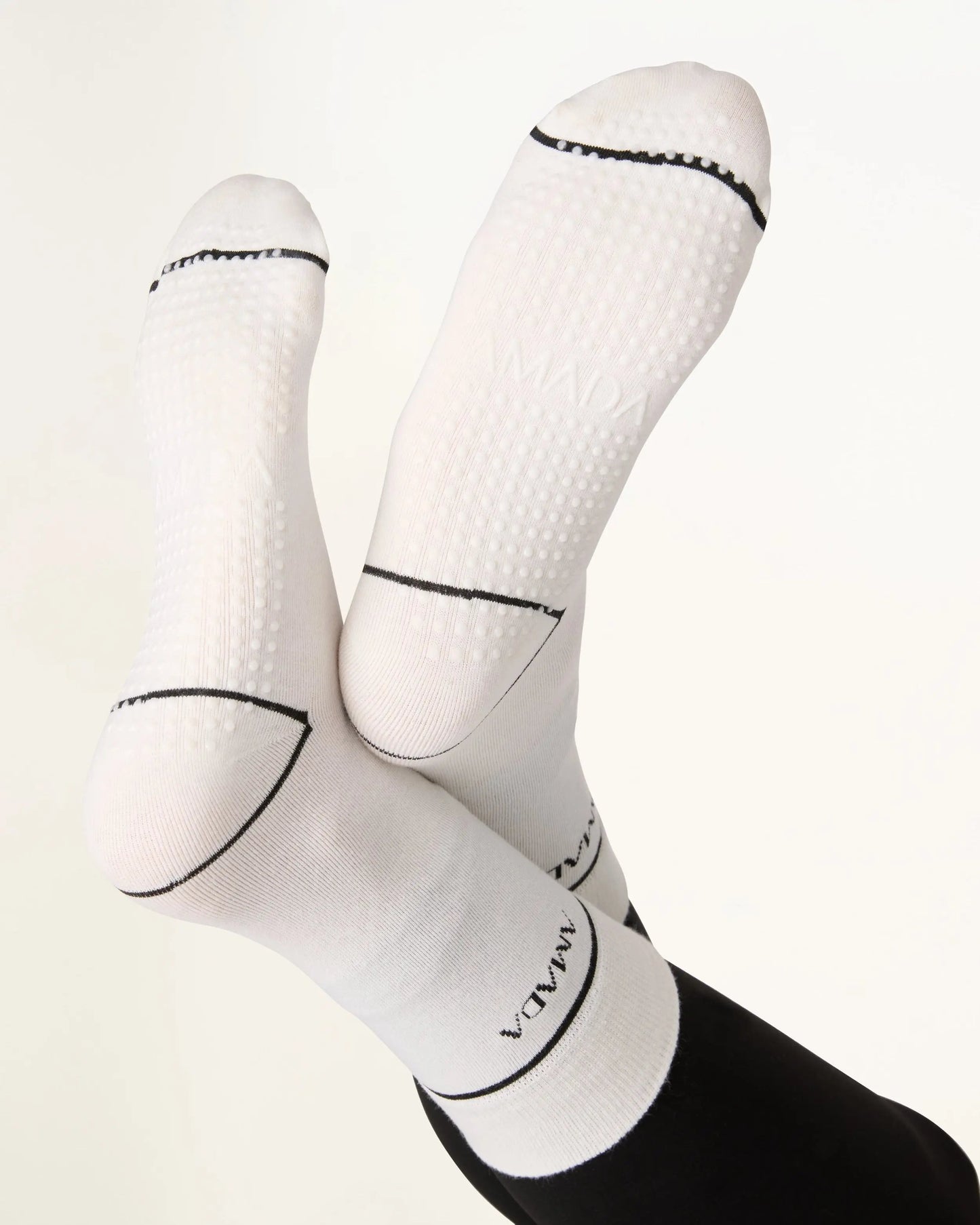 White socks with black accents on a white background