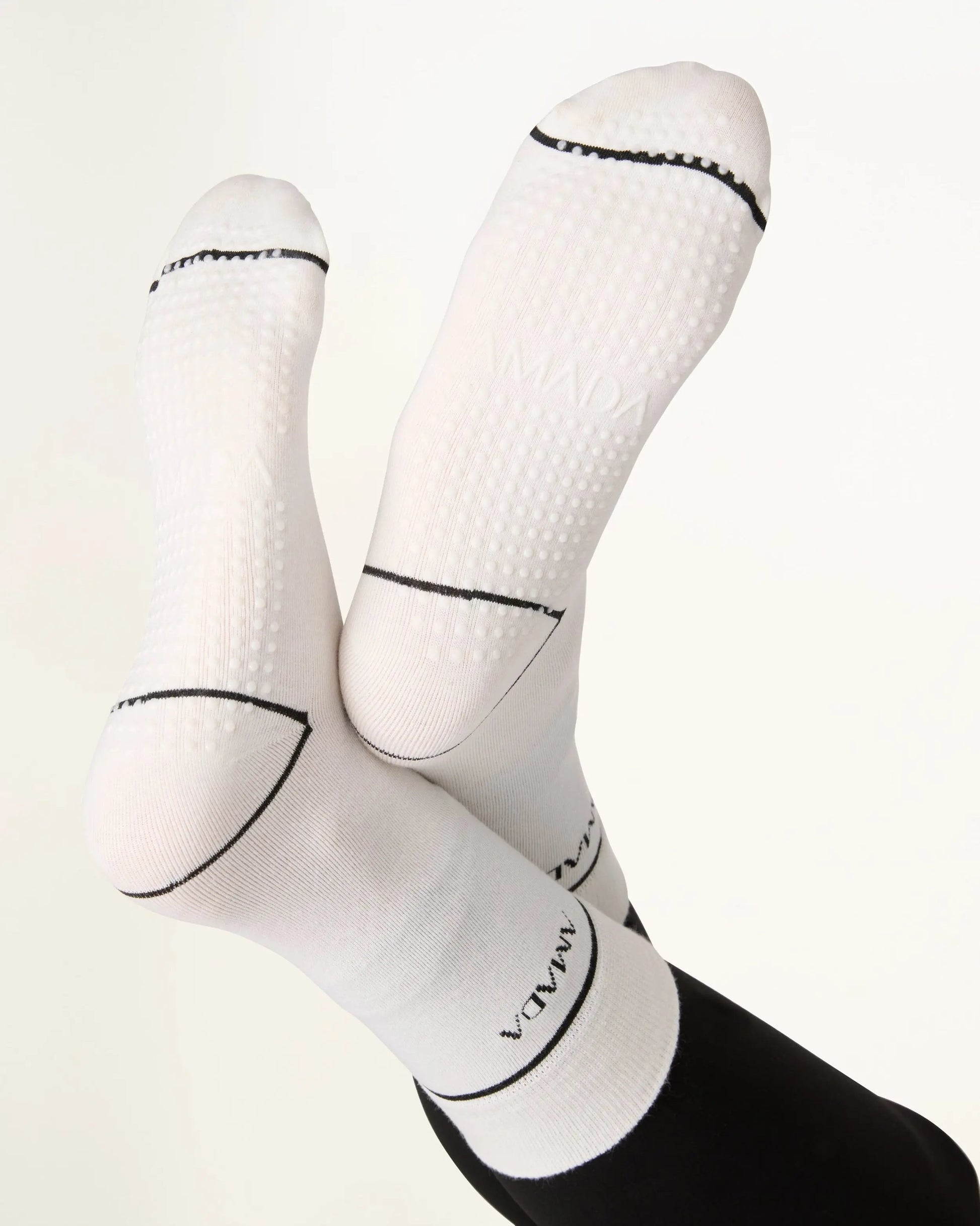 White socks with black accents on a white background