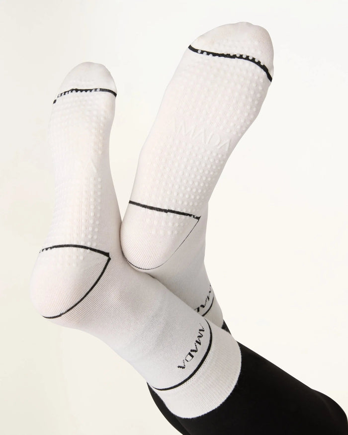 White socks with black accents on a white background